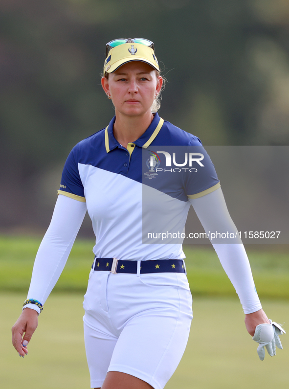 GAINESVILLE, VIRGINIA - SEPTEMBER 15: Emily Kristine Pedersen of Team Europe walks on the 13th green during the final round of the Solheim C...