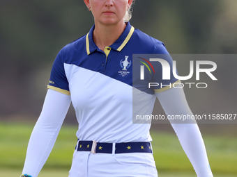 GAINESVILLE, VIRGINIA - SEPTEMBER 15: Emily Kristine Pedersen of Team Europe walks on the 13th green during the final round of the Solheim C...