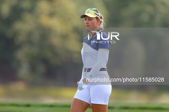 GAINESVILLE, VIRGINIA - SEPTEMBER 15: Emily Kristine Pedersen of Team Europe walks on the 13th green during the final round of the Solheim C...