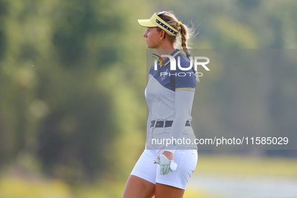 GAINESVILLE, VIRGINIA - SEPTEMBER 15: Emily Kristine Pedersen of Team Europe waits on the 13th green during the final round of the Solheim C...