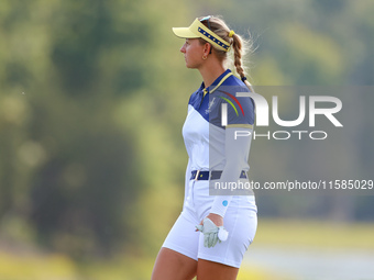 GAINESVILLE, VIRGINIA - SEPTEMBER 15: Emily Kristine Pedersen of Team Europe waits on the 13th green during the final round of the Solheim C...