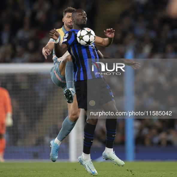 Marcus Thuram #9 of Inter Milan during the UEFA Champions League Group Stage match between Manchester City and Football Club Internazionale...