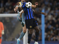 Marcus Thuram #9 of Inter Milan during the UEFA Champions League Group Stage match between Manchester City and Football Club Internazionale...