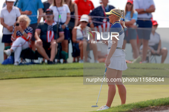 GAINESVILLE, VIRGINIA - SEPTEMBER 15: Charley Hull of Team Europe waits on the 13th green during the final round of the Solheim Cup at Rober...