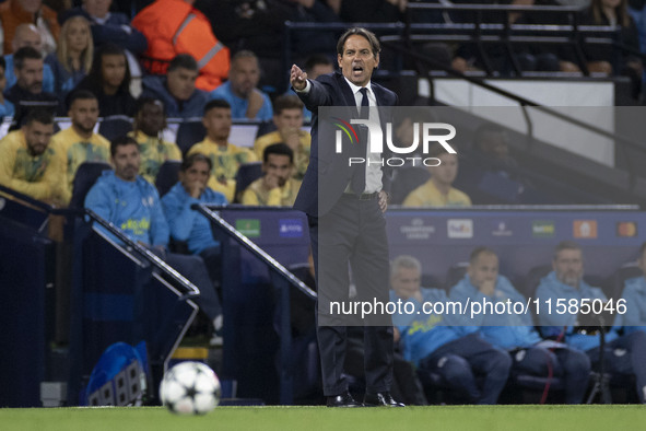 Inter Milan manager Simone Inzaghi gesticulates during the UEFA Champions League group stage match between Manchester City and Football Club...