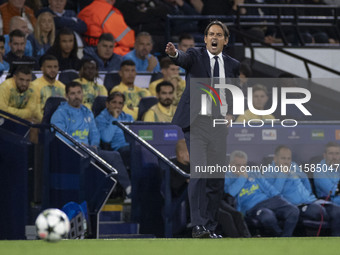 Inter Milan manager Simone Inzaghi gesticulates during the UEFA Champions League group stage match between Manchester City and Football Club...