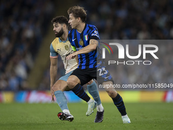 Nicolo Barella #23 of Inter Milan during the UEFA Champions League League Stage match between Manchester City and Football Club Internaziona...