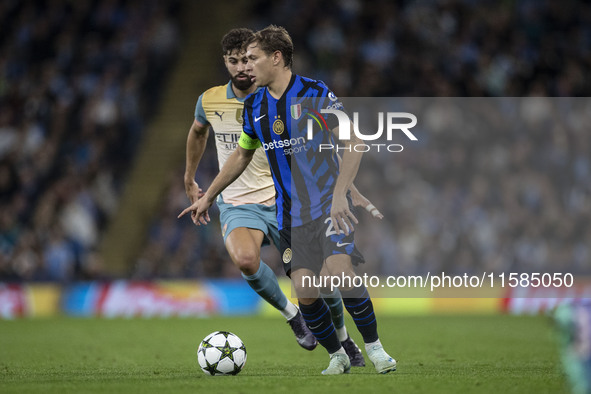 Nicolo Barella #23 of Inter Milan during the UEFA Champions League League Stage match between Manchester City and Football Club Internaziona...