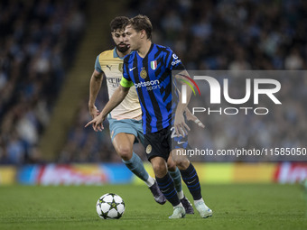 Nicolo Barella #23 of Inter Milan during the UEFA Champions League League Stage match between Manchester City and Football Club Internaziona...