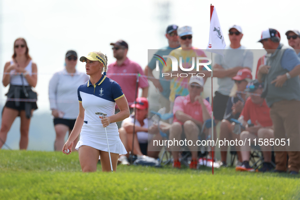 GAINESVILLE, VIRGINIA - SEPTEMBER 15: Charley Hull of Team Europe walks on the 13th green during the final round of the Solheim Cup at Rober...