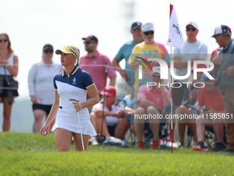 GAINESVILLE, VIRGINIA - SEPTEMBER 15: Charley Hull of Team Europe walks on the 13th green during the final round of the Solheim Cup at Rober...