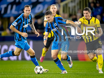 Club Brugge forward Christos Tzolis and Borussia Dortmund defender Marcel Sabitzer during the match between Club Brugge and Borussia Dortmun...