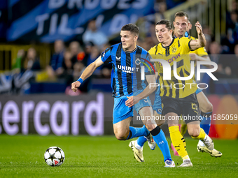 Club Brugge forward Christos Tzolis and Borussia Dortmund defender Marcel Sabitzer during the match between Club Brugge and Borussia Dortmun...