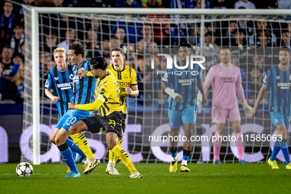 Club Brugge midfielder Hans Vanaken and Borussia Dortmund defender Emre Can during the match between Club Brugge and Borussia Dortmund at th...