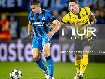 Club Brugge forward Christos Tzolis and Borussia Dortmund defender Marcel Sabitzer during the match between Club Brugge and Borussia Dortmun...