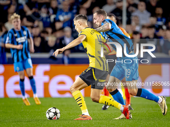 Borussia Dortmund defender Nico Schlotterbeck and Club Brugge forward Gustaf Nilsson during the match between Club Brugge and Borussia Dortm...