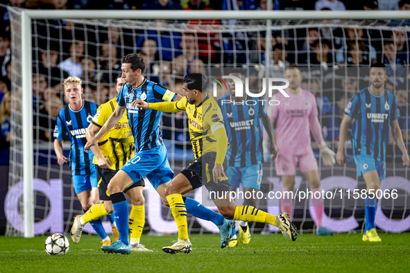 Club Brugge midfielder Hans Vanaken and Borussia Dortmund defender Emre Can during the match between Club Brugge and Borussia Dortmund at th...