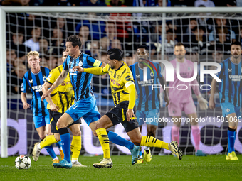 Club Brugge midfielder Hans Vanaken and Borussia Dortmund defender Emre Can during the match between Club Brugge and Borussia Dortmund at th...