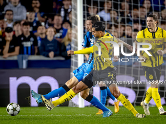 Club Brugge midfielder Hans Vanaken and Borussia Dortmund defender Emre Can during the match between Club Brugge and Borussia Dortmund at th...