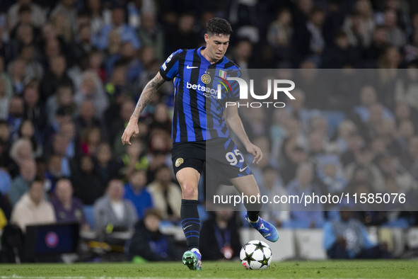 Alessandro Bastoni #95 of Inter Milan during the UEFA Champions League Group Stage match between Manchester City and Football Club Internazi...