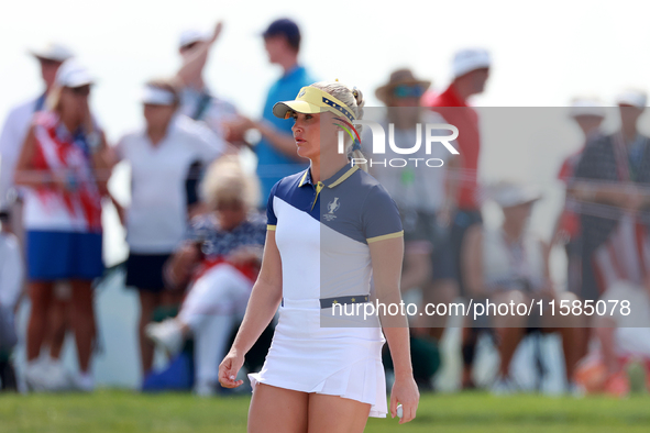 GAINESVILLE, VIRGINIA - SEPTEMBER 15: Charley Hull of Team Europe walks on the 13th green during the final round of the Solheim Cup at Rober...