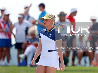 GAINESVILLE, VIRGINIA - SEPTEMBER 15: Charley Hull of Team Europe walks on the 13th green during the final round of the Solheim Cup at Rober...