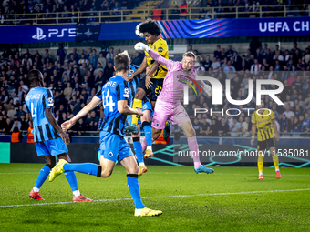 Borussia Dortmund forward Karim Adeyemi, Club Brugge goalkeeper Simon Mignolet, and Club Brugge defender Joaquin Seys during the match betwe...