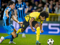 Club Brugge midfielder Hugo Vetlesen and Borussia Dortmund forward Karim Adeyemi during the match between Club Brugge and Borussia Dortmund...