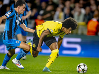 Club Brugge midfielder Hugo Vetlesen and Borussia Dortmund forward Karim Adeyemi during the match between Club Brugge and Borussia Dortmund...