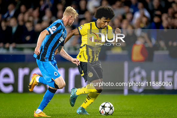 Club Brugge defender Joaquin Seys and Borussia Dortmund forward Karim Adeyemi during the match between Club Brugge and Borussia Dortmund at...