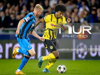 Club Brugge defender Joaquin Seys and Borussia Dortmund forward Karim Adeyemi during the match between Club Brugge and Borussia Dortmund at...