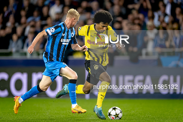 Club Brugge defender Joaquin Seys and Borussia Dortmund forward Karim Adeyemi during the match between Club Brugge and Borussia Dortmund at...