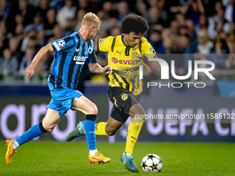 Club Brugge defender Joaquin Seys and Borussia Dortmund forward Karim Adeyemi during the match between Club Brugge and Borussia Dortmund at...