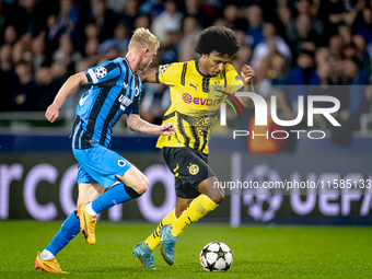 Club Brugge defender Joaquin Seys and Borussia Dortmund forward Karim Adeyemi during the match between Club Brugge and Borussia Dortmund at...