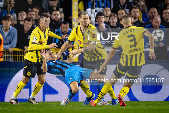 Club Brugge midfielder Hugo Vetlesen and Borussia Dortmund defender Niklas Sule during the match between Club Brugge and Borussia Dortmund a...