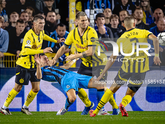 Club Brugge midfielder Hugo Vetlesen and Borussia Dortmund defender Niklas Sule during the match between Club Brugge and Borussia Dortmund a...