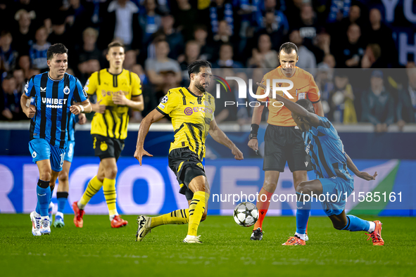 Borussia Dortmund defender Emre Can and Club Brugge defender Joel Ordonez during the match between Club Brugge and Borussia Dortmund at the...