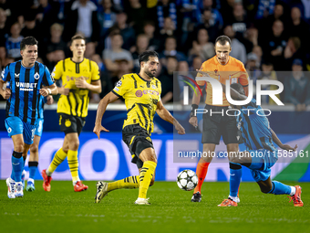 Borussia Dortmund defender Emre Can and Club Brugge defender Joel Ordonez during the match between Club Brugge and Borussia Dortmund at the...