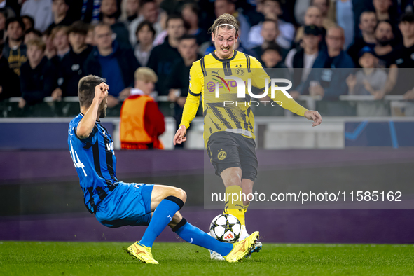 Club Brugge defender Brandon Mechele and Borussia Dortmund defender Julian Brandt during the match between Club Brugge and Borussia Dortmund...