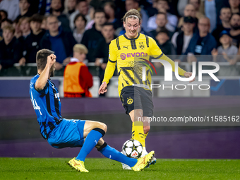 Club Brugge defender Brandon Mechele and Borussia Dortmund defender Julian Brandt during the match between Club Brugge and Borussia Dortmund...