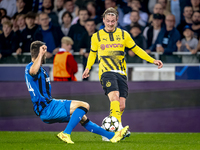 Club Brugge defender Brandon Mechele and Borussia Dortmund defender Julian Brandt during the match between Club Brugge and Borussia Dortmund...