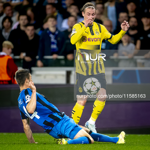 Club Brugge defender Brandon Mechele and Borussia Dortmund defender Julian Brandt during the match between Club Brugge and Borussia Dortmund...