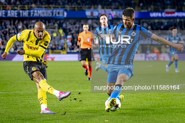 Borussia Dortmund forward Donyell Malen and Club Brugge defender Brandon Mechele during the match between Club Brugge and Borussia Dortmund...