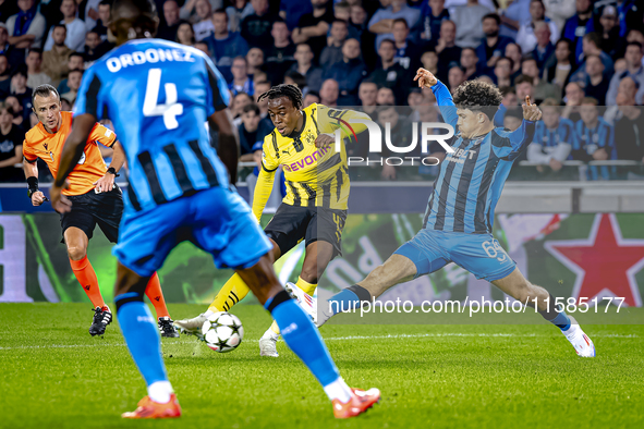 Borussia Dortmund defender Jamie Bynoe-Gittens and Club Brugge defender Kyriani Talbi during the match between Club Brugge and Borussia Dort...