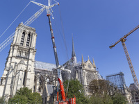 An exterior view of Notre Dame and construction cranes while the reconstruction process takes place in Paris, France, on September 15, 2024....