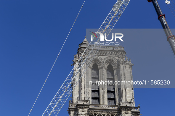 An exterior view of Notre Dame and construction cranes while the reconstruction process takes place in Paris, France, on September 15, 2024....