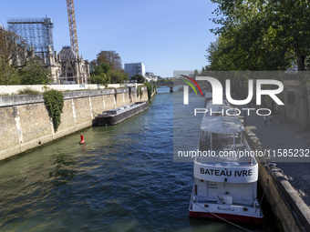 An exterior view of Notre Dame and construction cranes while the reconstruction process takes place in Paris, France, on September 15, 2024....