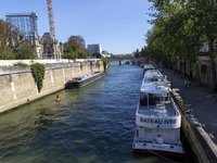 An exterior view of Notre Dame and construction cranes while the reconstruction process takes place in Paris, France, on September 15, 2024....