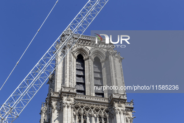 An exterior view of Notre Dame and construction cranes while the reconstruction process takes place in Paris, France, on September 15, 2024....