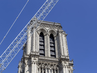 An exterior view of Notre Dame and construction cranes while the reconstruction process takes place in Paris, France, on September 15, 2024....